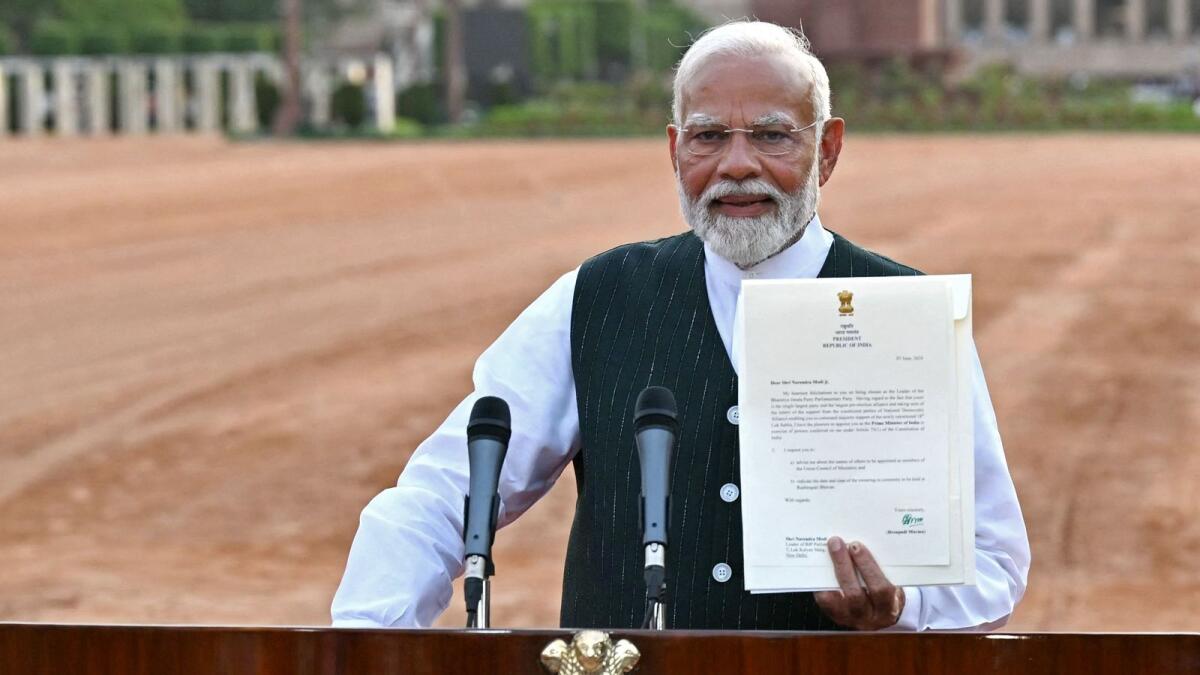 India: Modi invited to form government, to be sworn in on Sunday